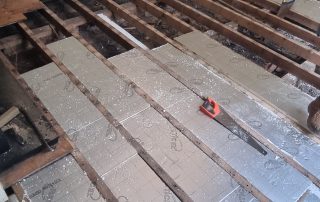 Floor joist strip-out during a house renovation in Southend