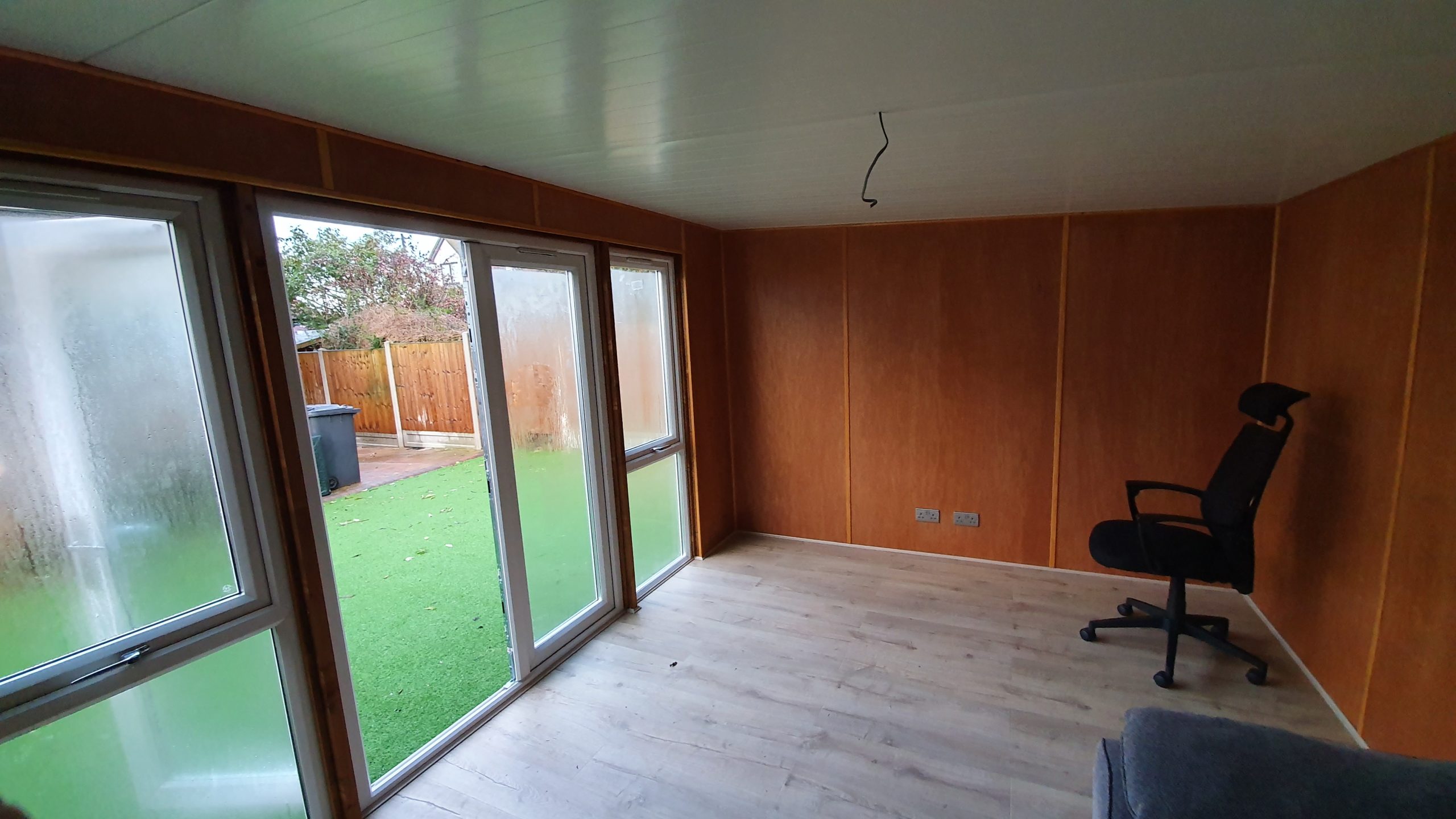 Garden room interior finish in Southend-on-Sea with glazing and completed wall finish
