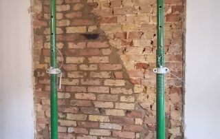 Exposed brickwork during internal renovation strip-out in Southend