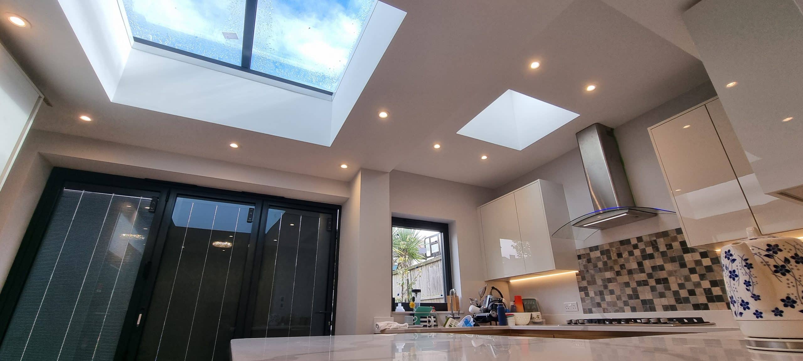 btom-construction-rear-extension-roof-construction-warm-roof-southend Skylight installation in rear extension kitchen Southend