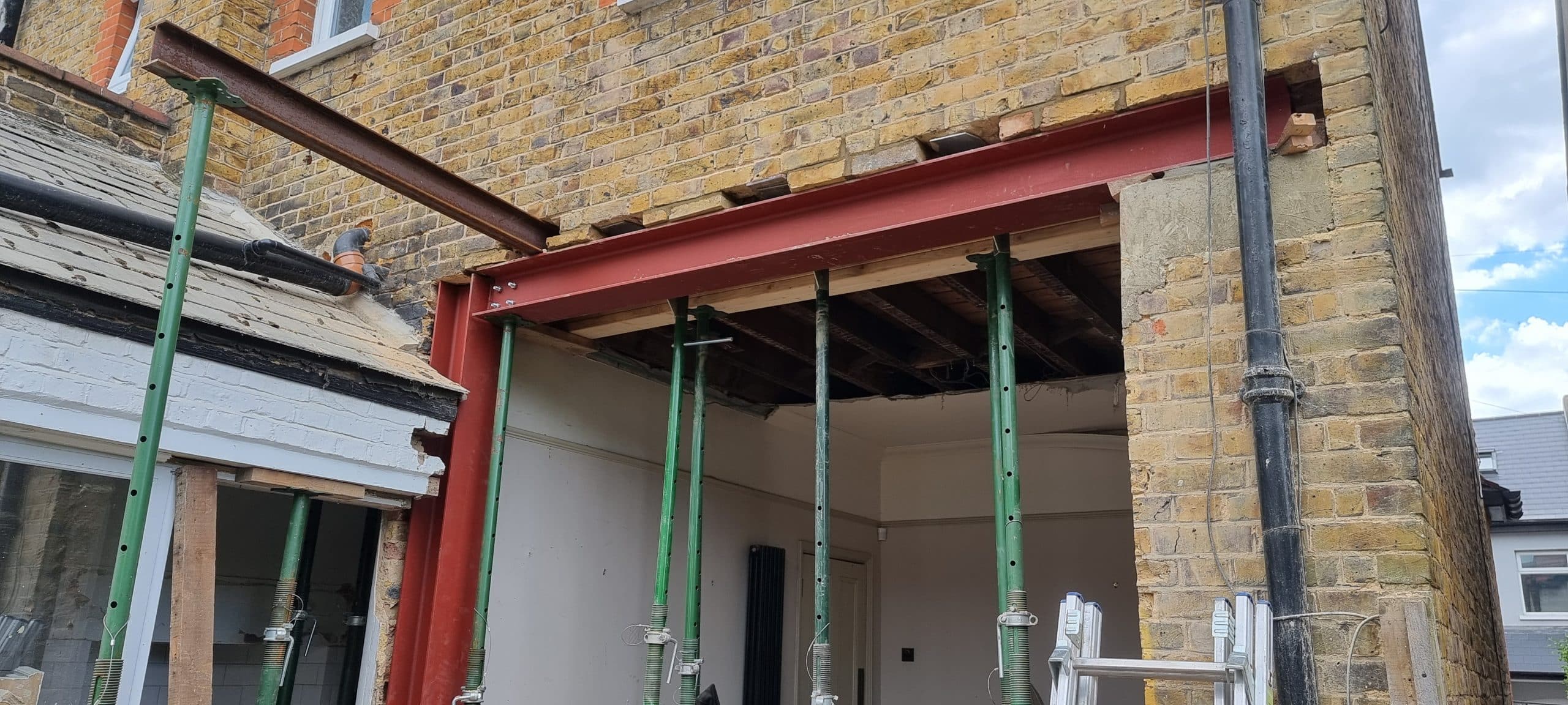 btom-rear-extension-bifold-doors-anthracite-southend RSJ steel beam installation supporting rear extension Southend